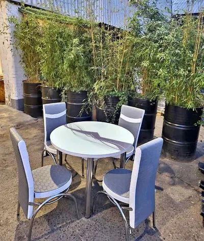 Round Dining Table — Grey Wave Glass